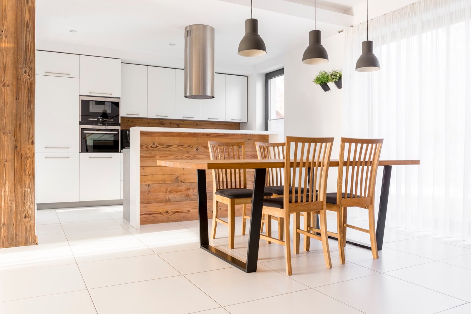 New white kitchen with table Luxury family home